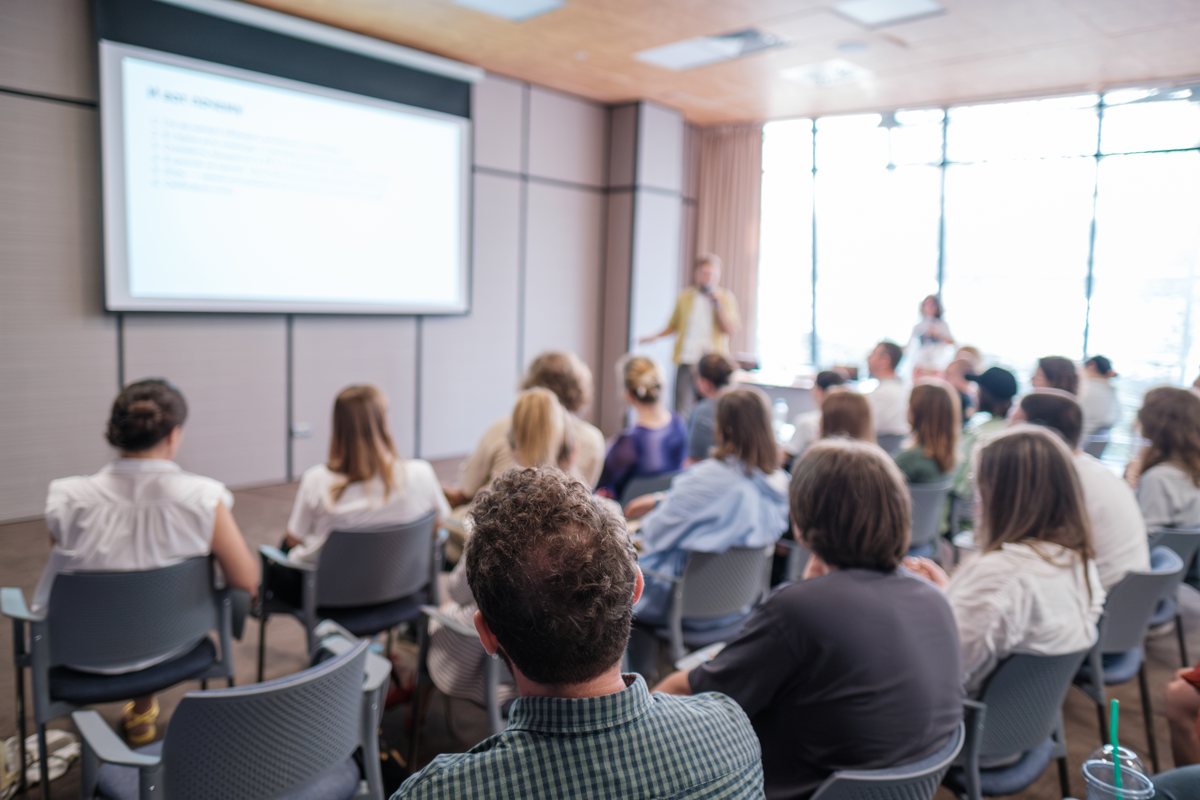 Therapists attending a professional training in a conference room