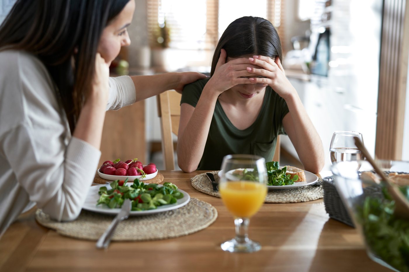 A person receiving support during a difficult meal